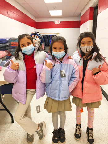 students from red bank primary with coats