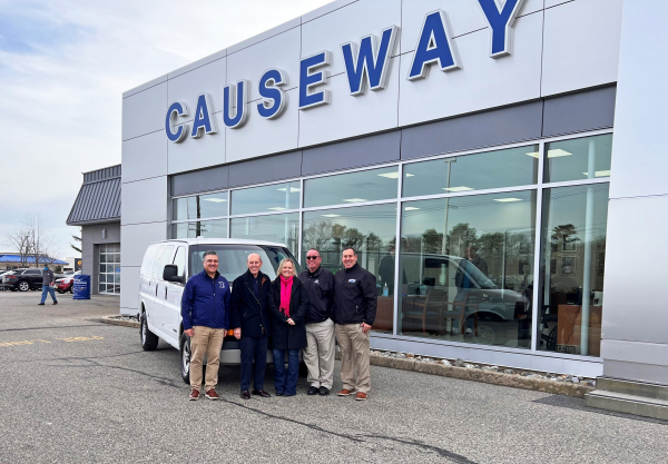 van donation to girl scouts at causeway