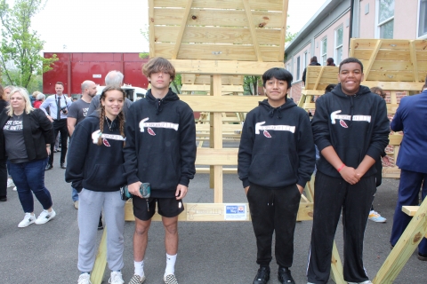 students with lifeguard stand